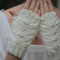 A Tunisian crochet afghan worked in a spiral, producing a thick blanket with a knitted appearance.